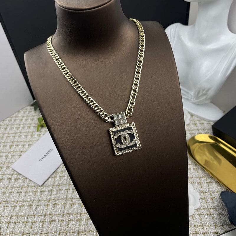 Chanel Metal & Diamond Pendant 18K Gold Necklace