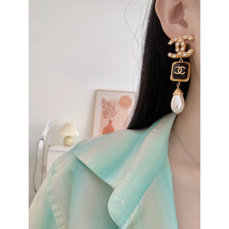 Chanel Long Pearl Pendant 18K Gold Earrings